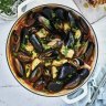 Tomato poached fish and shellfish.