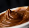 Dulce de leche's history is fraught, with several South American countries claiming its origin.