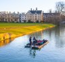  River Cam and tourist's boat.