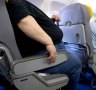 Traveller letters: Seated next to two obese people on a flight, I was left with half a seat 