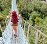 The Bowtell Swing Bridge, a narrow, precarious-looking suspension bridge built in 1991 by the 1st Field Squadron of the Royal Australian Engineers..