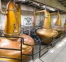 Hand crafted copper pot stills inside the Teeling Distillery, Newmarket, The Liberties.