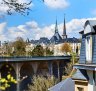 Picturesque Luxembourg city. Passerelle Bridge and steeples of Notre Dame Cathedral. Luxembourg, Western Europe