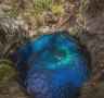 Swimming in a cenote in Mexico with G Adventures.