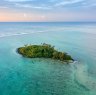 An aerial view of Muri Lagoon at sunrise on Rarotonga in the Cook Islands.