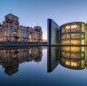 The famous Reichtsag and the Paul-Loebe-Haus at the river Spree in Berlin.