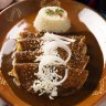 In Mexico, keep your eyes peeled for "enmoladas" -  a dish of corn tortillas drowned in mole sauce. 