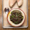 Hummus loaded with lentil and grain salad.