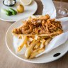 Josh Niland's batter-fried fish, chips and condiments.