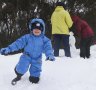 Geoffrey, Chris, Jody and Florence McDowell from the northern beaches, during opening day of the ski and snowboard season at Thredbo resort, on Saturday 12 June 2021. fedpol Photo: Alex Ellinghausen