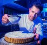 Tarts Anon chef Gareth Whitton dusting his signature pear creation.