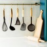 Hang utensils (or pots) on a rack, and lean chopping boards against splashbacks.