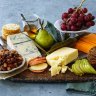 Create different heights to make a cheese plate look appealing.