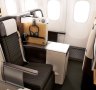 Business-class seats on Swiss International Air Lines'
Boeing 777-300ERs are flatbed, and there's a compartment for shoes and a drawer beneath the TV screen for other items.