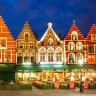 Night image of north side of Market Square, with enchanting street cafes, meeting place of the Bruge.
