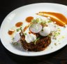 The big, burger-like corn fritters at The Sawmill in West Pymble.