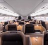 Business class has 28 suites in a 1-2-1 layout, giving each passenger direct aisle access.