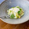 The creamy local burrata is ringed with a delicate zucchini, squash and mint salad.