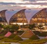 The airport, which opened in 2006 is a long, low structure that resembles a series of angular, wave-like forms. 