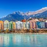 Innsbruck is surrounded by mountains.