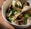 Clams with slow-cooked pig's head, confit garlic and greens is the go-to dish.