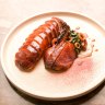 Dry-aged roast duck with quandong, black cabbage and bamboo.