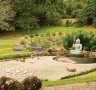 Crystal Castle's main drawcard is its Shambhala Gardens, tucked into spectacular hinterland folds of hills.