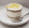 A single-serve puck of ricotta and pear cheesecake from Pari Pasticceria.