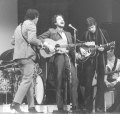 Bob Dylan performing with The Band at Carnegie Hall in January 1968. The house where they wrote and recorded many of their songs together is available for rent.