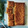 Anzac biscuit-inspired oat slice with coconut caramel topping.