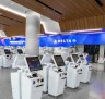 T2 and T3 share an airy new Delta check-in/bag drop area with 32 self-serve booths and 46 check in positions. 