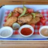 Fried chicken wings with pressed watermelon, chipotle aioli, pickles and tahini yoghurt.