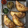 Empanadas filled with beef, chorizo and roasted tomatoes.
