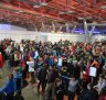 One of the most popular cities to visit: Travellers queue at Salzburg Airport Terminal 1.