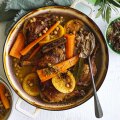 Braised duck legs with carrots, chickpeas, orange and anise.