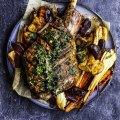 The lamb perfumes the vegetables as they roast.