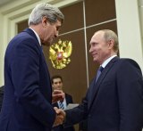 US Secretary of State John Kerry shakes hands with Russian President Vladimir Putin in Sochi on Tuesday. 