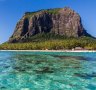 The imposing Le Morne mountain sits on the edge of the beach.