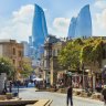 The inner city of Baku with the Flame Towers  in the background.