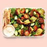 It's easy to make your own pita chips for this falafel salad.