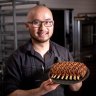 Khanh Nguyen with a shortcrust pastry-wrapped rack of lamb.