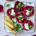 Italian-style capsicum halves topped with mozzarella, anchovy and basil.