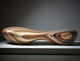 The Remix chaise longue, carved from different woods and plastics.