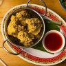 Crispy deep-fried chicken wings with chilli sauce.