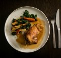 Go-to dish: Roasted duck with carrots, parsnips and cavolo nero.