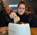 First, you put the toast in (here's Lucy Wiseman demonstrating for us)