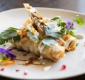 Duck borek: House-made yufka pastry filled with shredded duck, onions, currants and pinenuts.