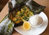 Lakes Entrance baby Silver Whiting, wrapped in banana leaves with Hoi An lemongrass, chilli and turmeric paste.