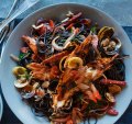 Squid ink pasta with vongole, chorizo and roasted prawn oil, and a pear, parmesan and rocket salad on the side.