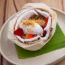 Coconut sorbet and jelly served in a young coconut.